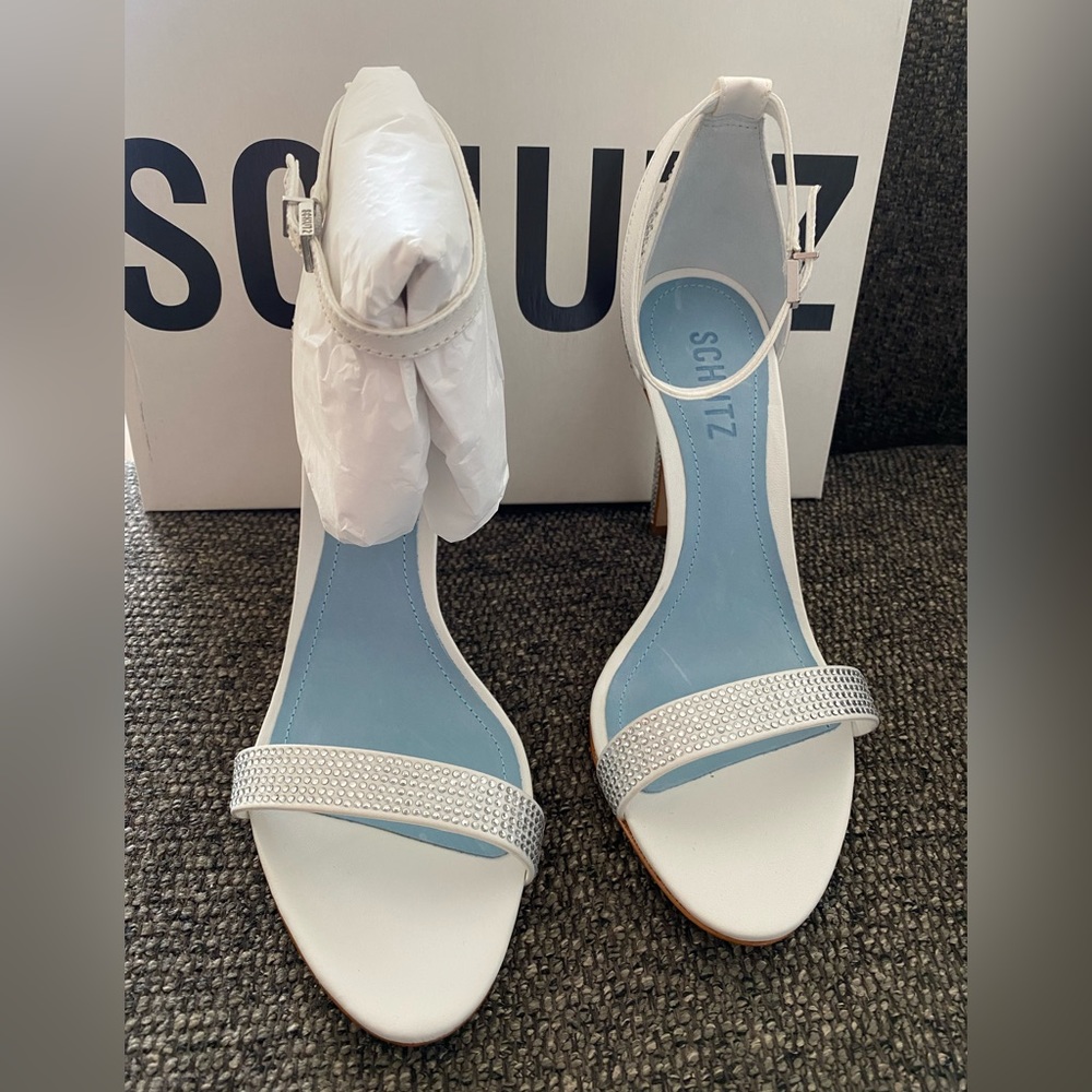 Brand new Schutz white shoes, size 7.5. Retail $250